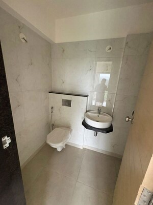 Bathroom in 1 BHK Apartment at MICL Aaradhya Parkwood, Mira Road – for Sale