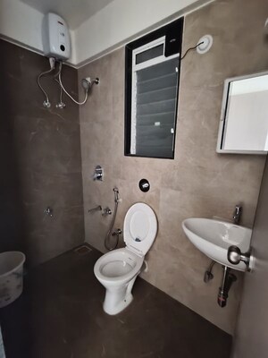 Bathroom in 2 BHK Apartment at Mahavir Kalpavruksha, Ghodbunder Road – for Rent