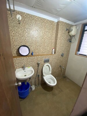 Bathroom in 2 BHK Apartment at Lodha Downtown, Dombivli East – for Rent