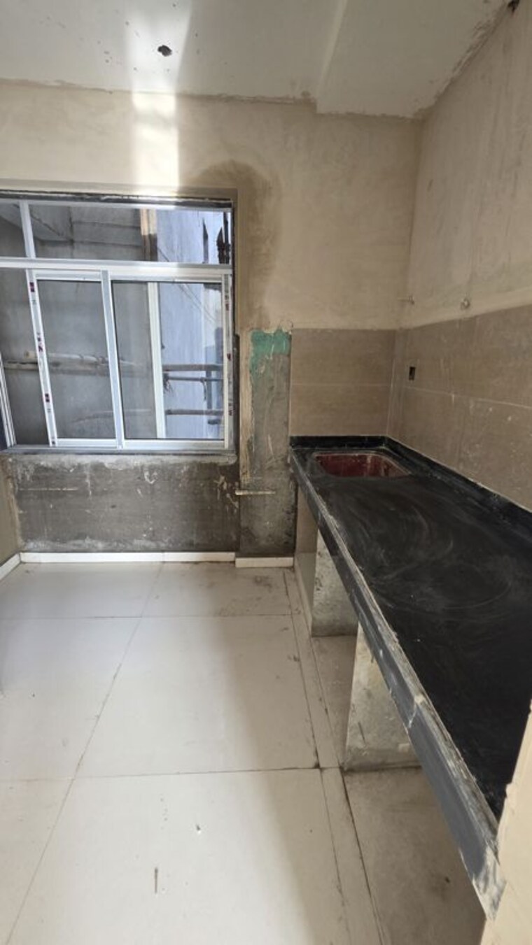 Kitchen, estelle-bellagio 2 Bedroom 815 Sq.Ft. Apartment In Agripada Mumbai 10659533