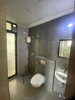 Bathroom in 1 BHK Apartment at Lodha Downtown, Dombivli East – for Rent