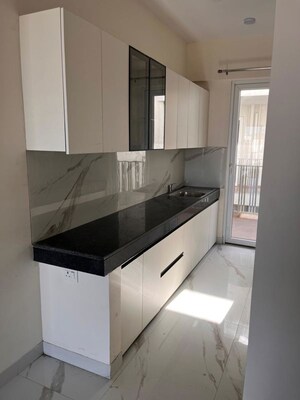 Kitchen in 2.5 BHK Apartment at The Center Court, Sector 88a – for Rent