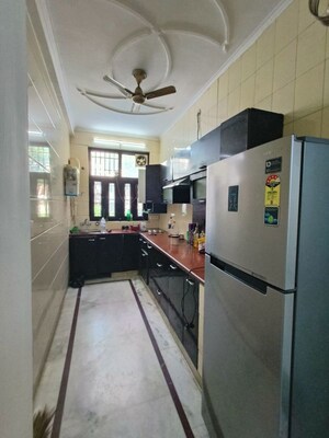 Kitchen in 4 BHK Apartment at Ambience Island Lagoon, Sector 24 – for Sale