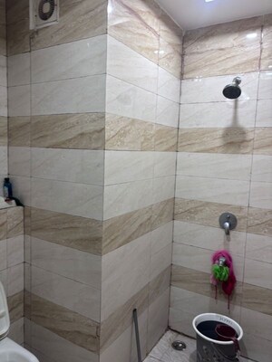 Bathroom in 3 BHK Builder Floor at Shiwalik Greens, Dhakoli – for Rent