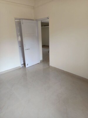 Room in 2 BHK Apartment at Kasturba Housing Society, Vishrantwadi – for Rent