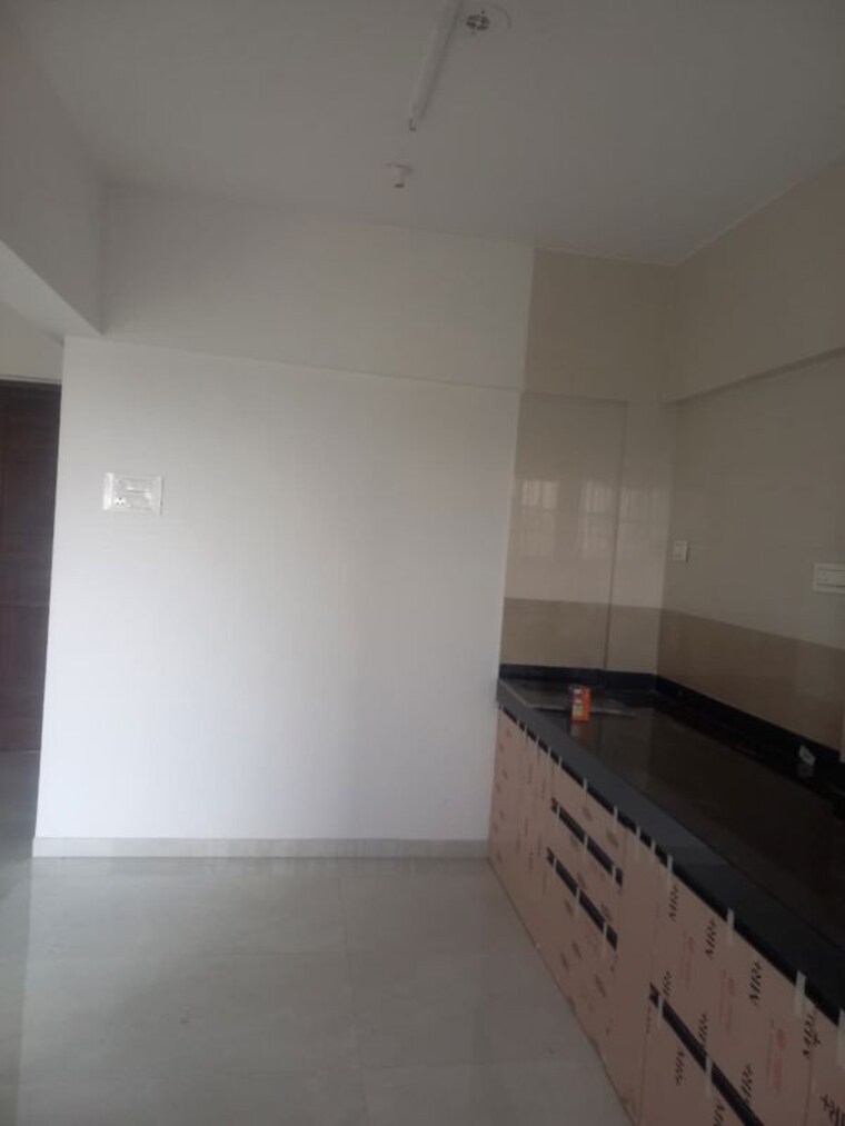 Kitchen, alpine-astonia 3 Bedroom 1010 Sq.Ft. Apartment In Kiwale Pune 10659599