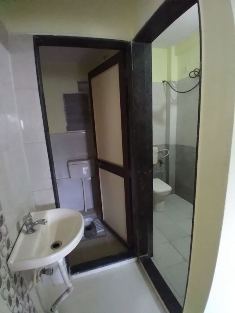 Bathroom, sai-apartment-wadgaon 2 Bedroom 824 Sq.Ft. Apartment In Wadgaon Sheri Pune 10659616