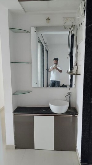 Bathroom in 2 BHK Apartment at Ravinanda Skylights, Wagholi – for Rent
