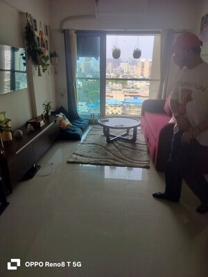 Living Room in 2 BHK Apartment at Cosmopolis Tower, Andheri West – for Rent