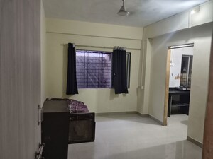 Living Room in 1 BHK Apartment at Juhu Taj CHS, Vile Parle West – for Rent