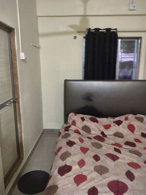 Bedroom in 1 BHK Apartment at Juhu Taj CHS, Vile Parle West – for Rent