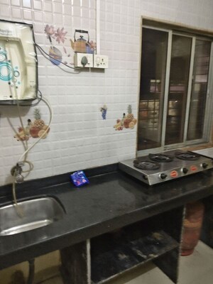 Kitchen in 1 BHK Apartment at Juhu Taj CHS, Vile Parle West – for Rent
