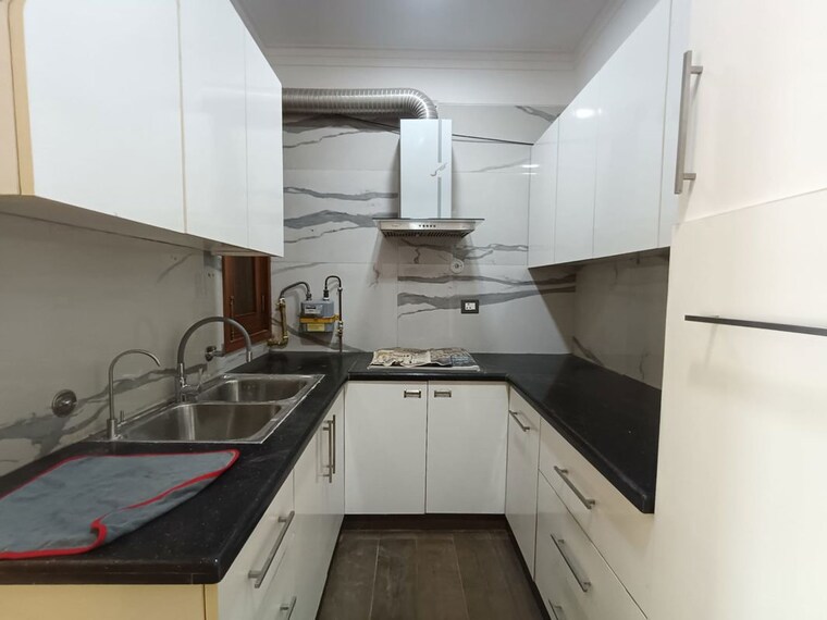 Kitchen, hemkunt colony 3 Bedroom 190 Sq.Yd. Builder Floor In Hemkunt Colony Delhi 10660198