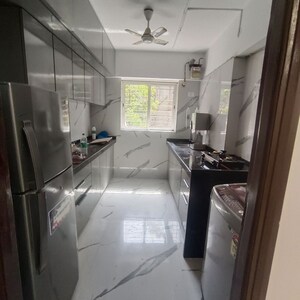 Kitchen in 1 BHK Apartment at Paradigm Antalya, Oshiwara – for Sale