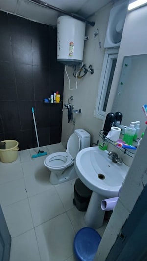 Bathroom in 3.5 BHK Apartment at Antriksh Golf View, Sector 78 – for Rent