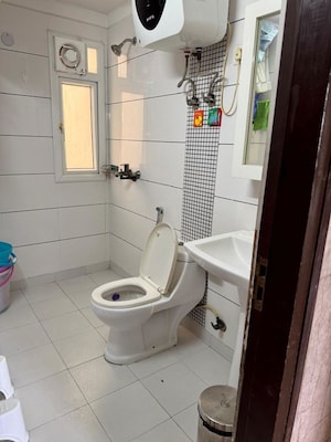 Bathroom in 3.5 BHK Apartment at Antriksh Golf View, Sector 78 – for Rent