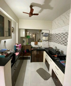 Kitchen in 3 BHK Apartment at Woodsville Phase III, Moshi – for Rent
