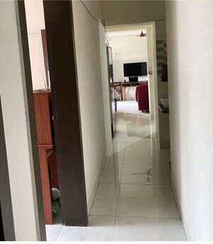 Building Lobby in 3 BHK Apartment at Woodsville Phase III, Moshi – for Rent