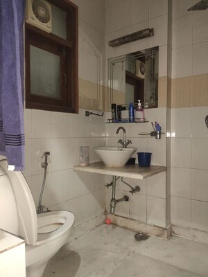 Bathroom in 3 BHK Builder Floor at Kalkaji – for Rent