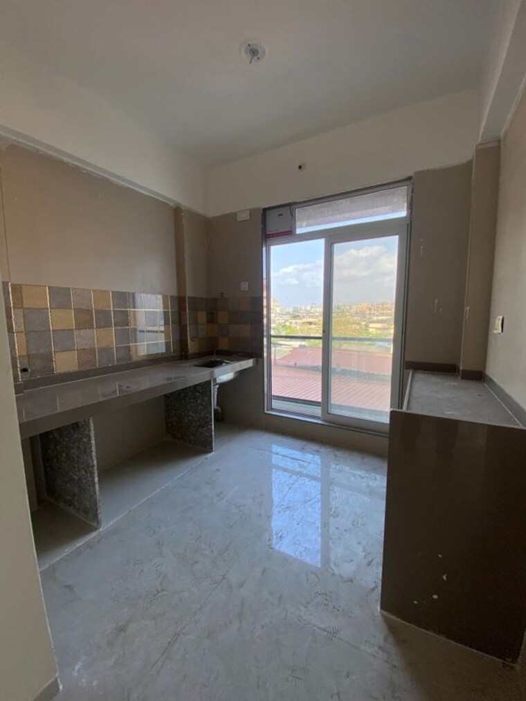 Kitchen, tharwani-vedant-palacia 2 Bedroom 693 Sq.Ft. Apartment In Khadakpada Thane 10660455