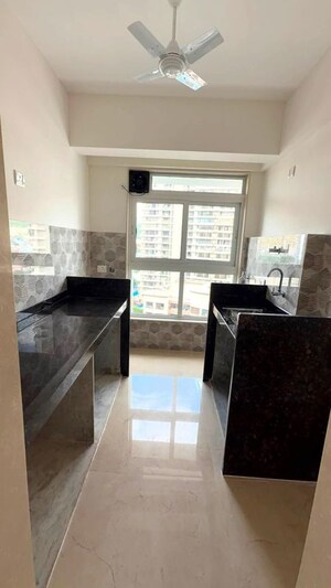 Kitchen in 1 BHK Apartment at Group Satellite Elegance, Goregaon East – for Rent