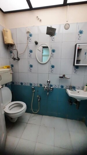 Bathroom in 1 BHK Apartment at Abrol Krishna Utsav, Malad West – for Rent