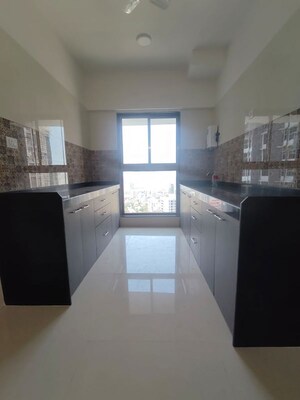 Kitchen in 3 BHK Apartment at Raj Infinia, Malad West – for Rent