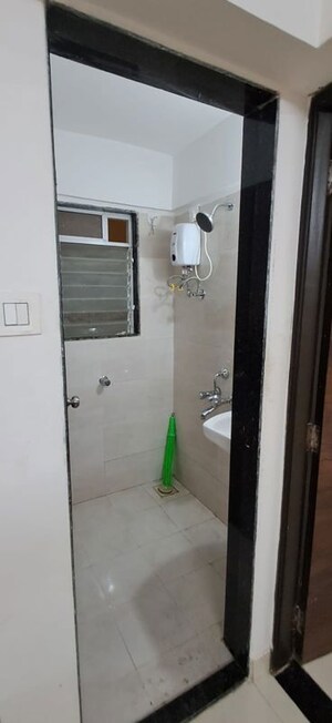 Bathroom in 1 BHK Apartment at DGS Sheetal Tapovan, Malad East – for Rent