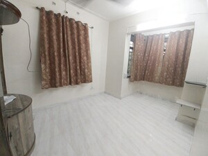 Bedroom in 3 BHK Apartment at Dorabjee Paradise Building A&B Condominium, Mohammadwadi – for Rent