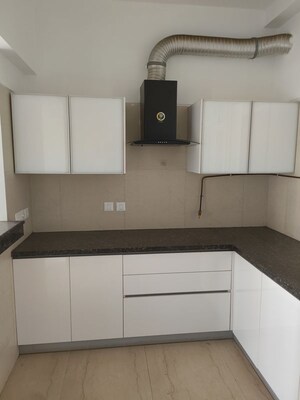 Kitchen in 3.5 BHK Apartment at Microtek Greenburg, Sector 86 – for Rent