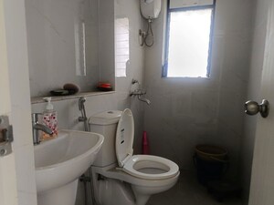 Bathroom in 1 BHK Apartment at Runwal Gardens Phase 3, Dombivli East – for Rent
