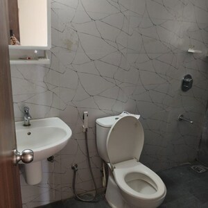 Bathroom in 2 BHK Apartment at Gagan Adira, Wagholi – for Rent