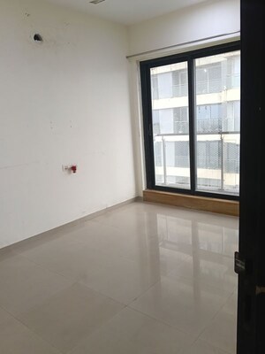 Room in 2 BHK Apartment at Rustomjee Elanza, Malad West – for Rent