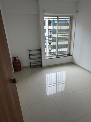 Room in 2 BHK Apartment at Gravity Austin Plaza, Wakad – for Rent