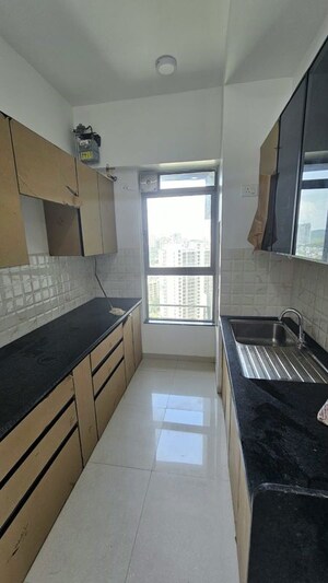 Kitchen in 3 BHK Apartment at Kalpataru Immensa, Kolshet Road – for Rent