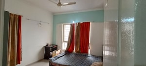 Bedroom in 2 BHK Apartment at Dwarka Suncrest Phase 3, Pimple Saudagar – for Rent