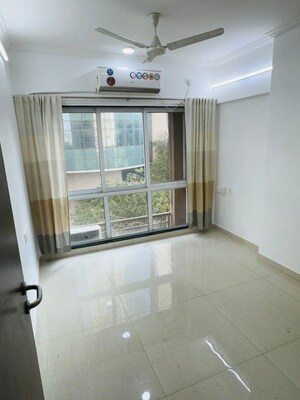 Room in 2 BHK Apartment at Bini Winspace Amelio, Andheri West – for Rent