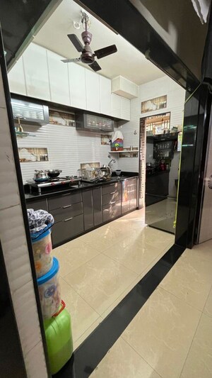 Kitchen in 1 BHK Apartment at Green Acres Apartment, Waghbil – for Rent