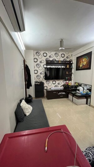 Living Room in 1 BHK Apartment at Green Acres Apartment, Waghbil – for Rent