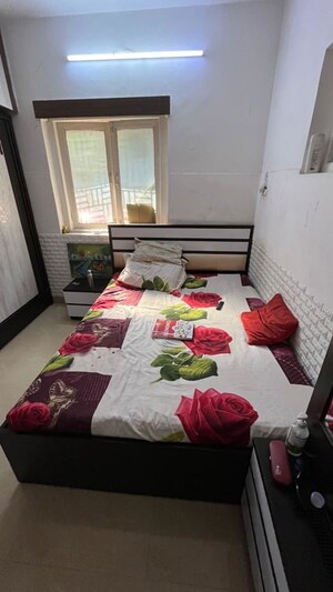 Bedroom in 1 BHK Apartment at Green Acres Apartment, Waghbil – for Rent
