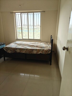 Bedroom in 2 BHK Apartment at Pristine East Winds, Wagholi – for Rent