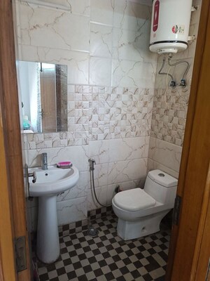 Bathroom in 1 BHK Builder Floor at Freedom Fighters Enclave – for Rent