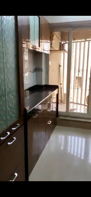 Kitchen in 3 BHK Apartment at Anmol Towers, Goregaon West – for Sale
