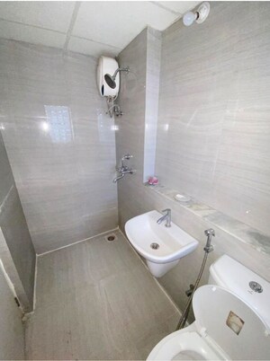Bathroom in 1 BHK Apartment at Runwal Gardens, Dombivli East – for Rent