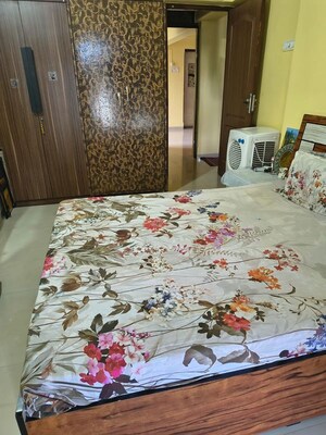 Bedroom in 1 BHK Apartment at Akshar Apartments, Borivali West – for Rent