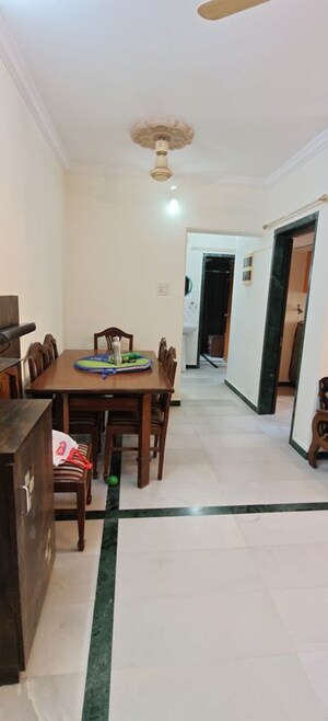 Living Room in 2 BHK Apartment at Blue Bell Apartments, Malad West – for Rent