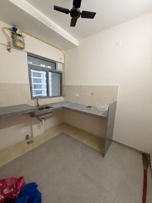 Kitchen in 1 BHK Apartment at Piramal Vaikunth, Balkum Pada – for Rent