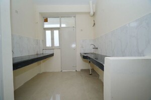 Kitchen in 2 BHK Apartment at Techman Moti Residency Phase II, Raj Nagar Extension – for Sale
