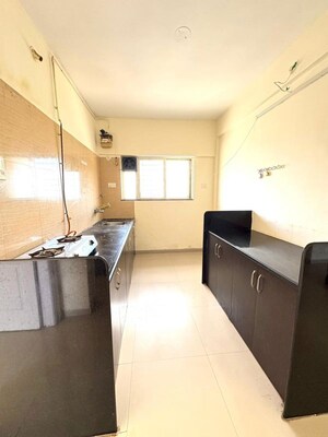 Kitchen in 1 BHK Apartment at Sukhwani Callisto, Wakad – for Rent