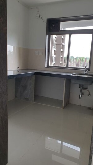 Kitchen in 2 BHK Apartment at Runwal Eirene, Balkum Pada – for Rent